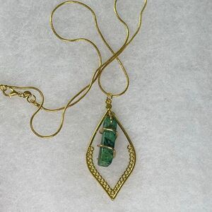 19K Gold Electroplated chain and died Howlite pendant.
